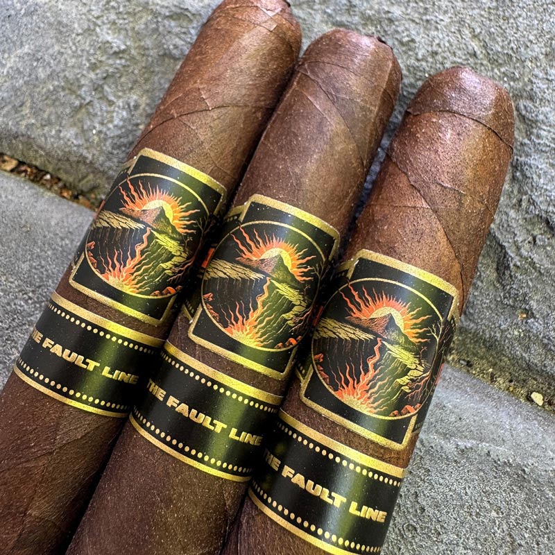 Cigar band design, cigar branding, packaging artwork, and premium tobacco product identity created by Hellbeing Agency for Wildfire Cigars.
