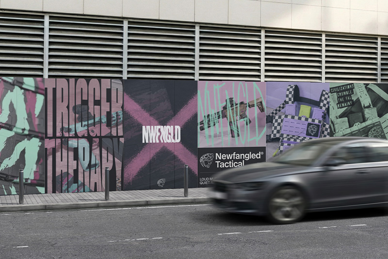 Street mural of Newfangled Tactical posters — "Trigger Therapy" typography, a spray-painted NWFNGLD "X," a customized rifle, and a checkered tactical chest rig in pink, purple, and mint.