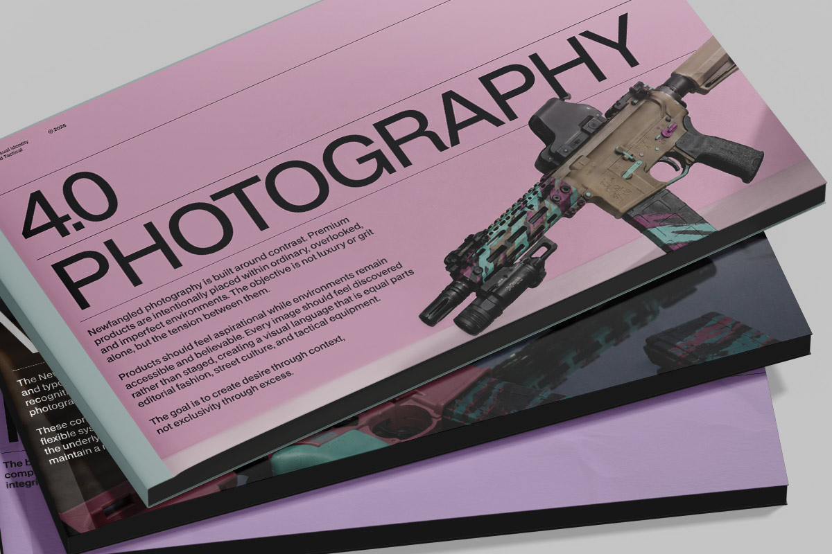 A printed landscape Newfangled Photography brand book section with a custom rifle on the cover.